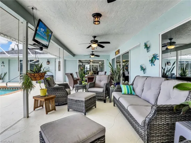 Lanai featuring 3 ceiling fans