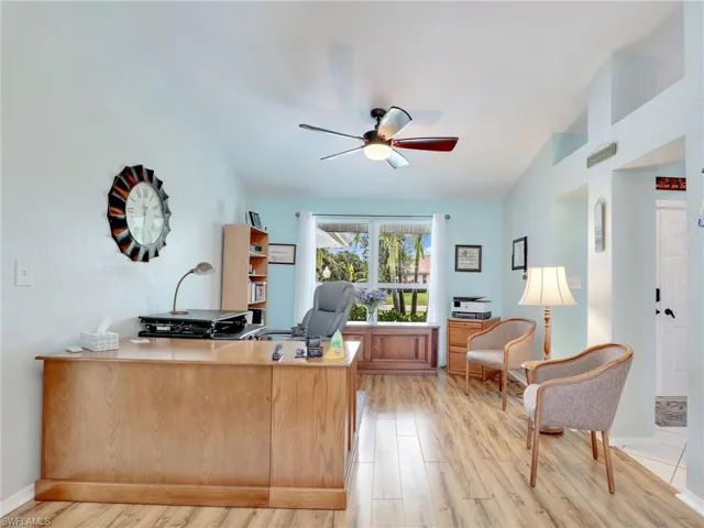 Dining Room currently used as Home office with ceiling fan and vaulted ceiling