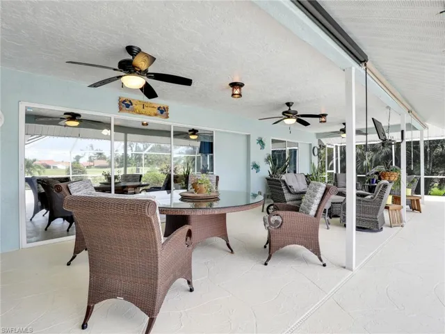 View of patio with ceiling fan