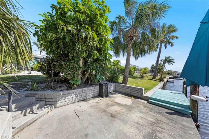 View of patio with a dock