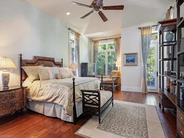 Bedroom featuring dark wood-style flooring, ceiling fan, access to exterior, and recessed lighting