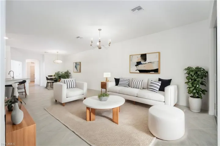 Spacious and open living and dining area, open to the kitchen and home office.