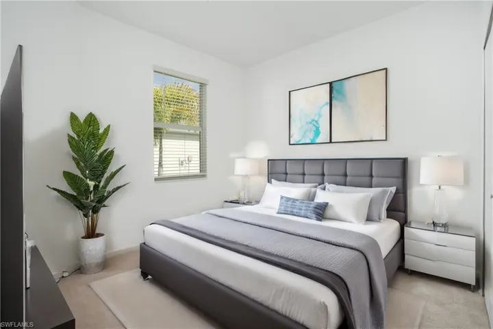 Guest bedroom with freshly cleaned carpeting. This room also has a large closet with bi fold doors