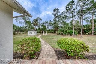 Brick pavers to fire pit and pergola