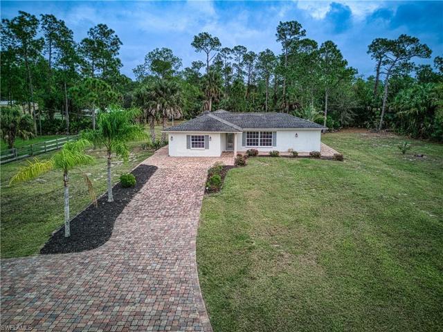 Front of home, brick paver driveway