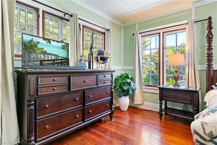 Upstairs primary bedroom offers cedar closet