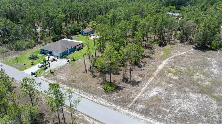 Drone / aerial view of a heavily wooded area
