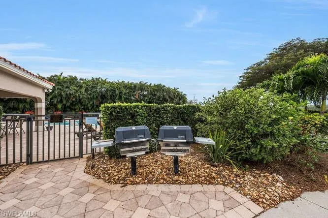 View of patio / terrace with fence and grilling area