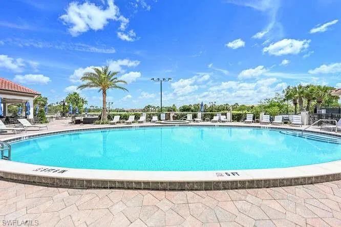 Pool with fence and a patio