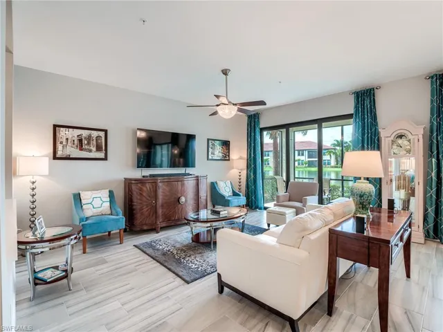 Living room featuring ceiling fan