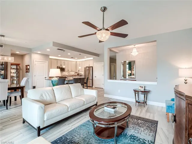 Living room featuring ceiling fan