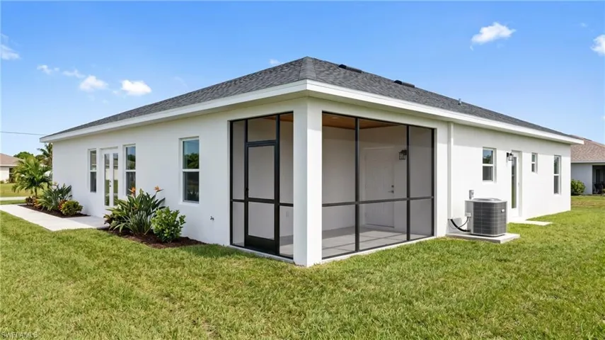 Rear of home with screened patio. Digital rendering.