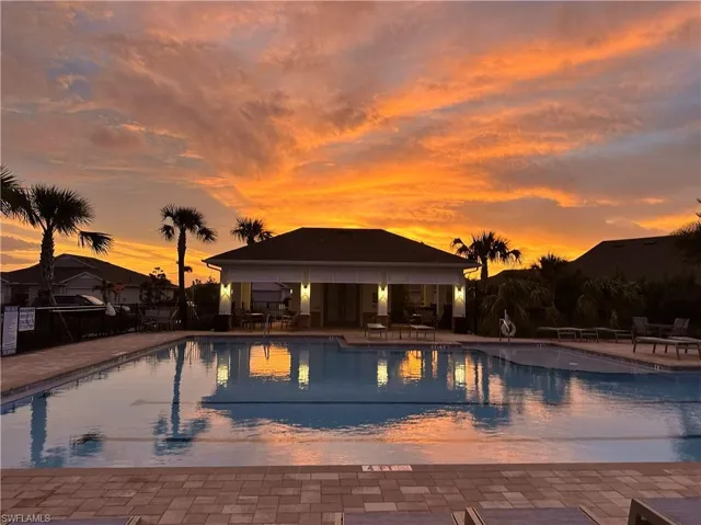 Community pool featuring a patio area