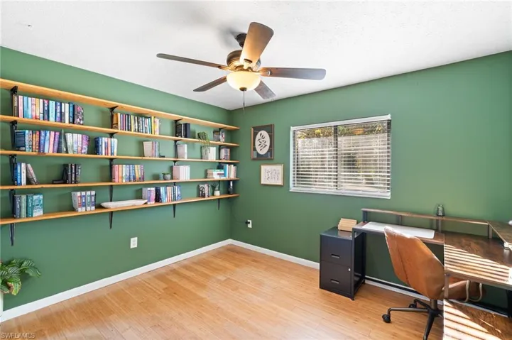 Home office featuring light wood-type flooring