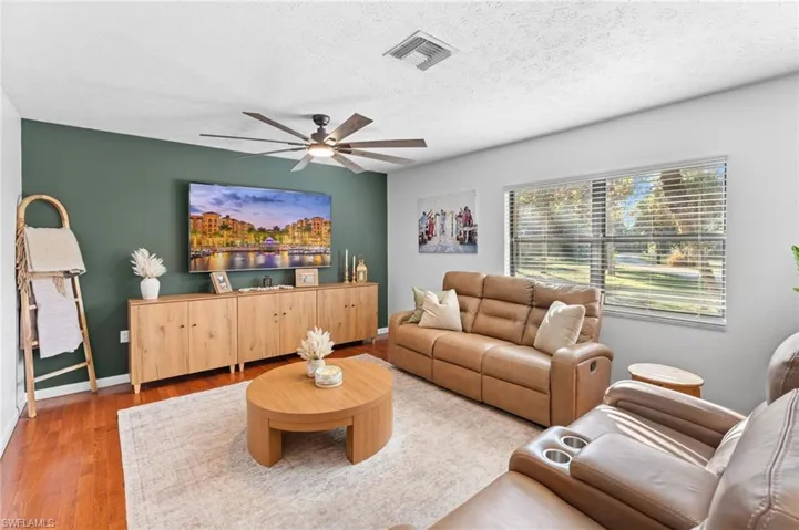 Living area with a wood finished floors