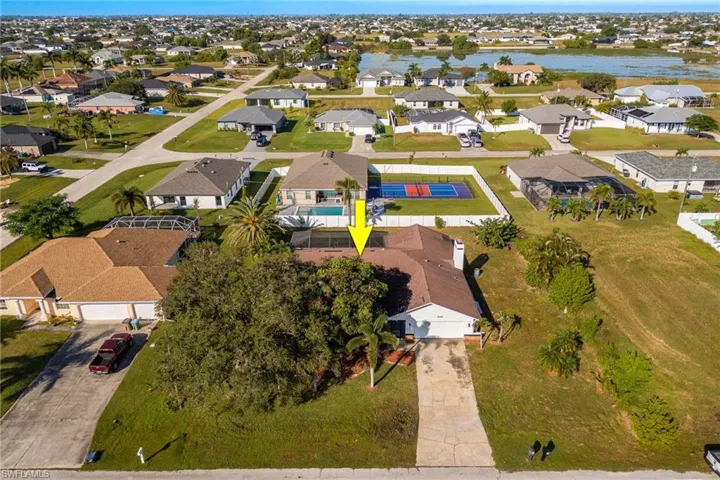 View of property location featuring nearby suburban area and a large body of water