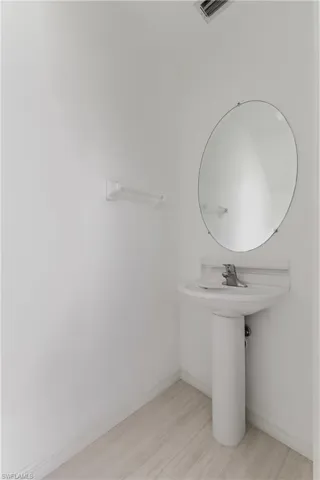 Half bath with pedestal sink