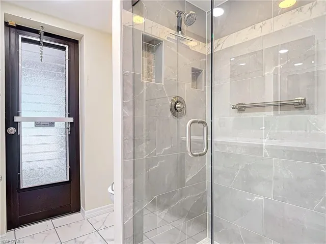 Bathroom with an enclosed shower