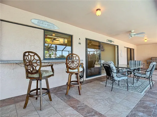 View of patio / terrace with ceiling fan