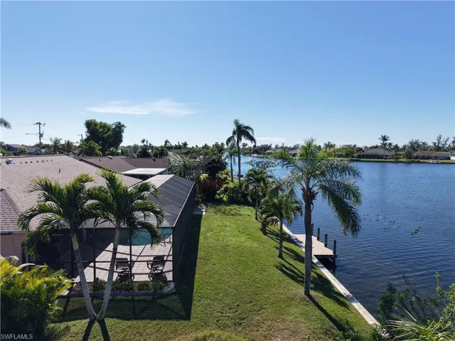 Property view of water featuring a dock