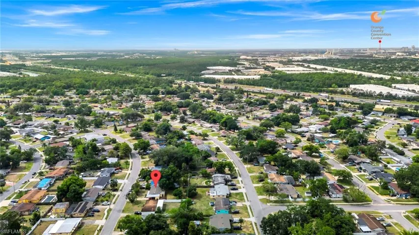 Birds eye view of property with a residential view