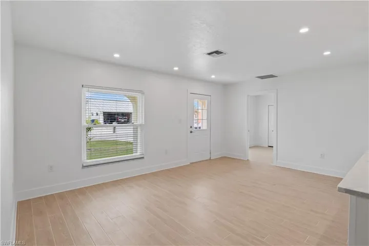 Comfortable and inviting space that flows seamlessly to dining and outdoor areas.
