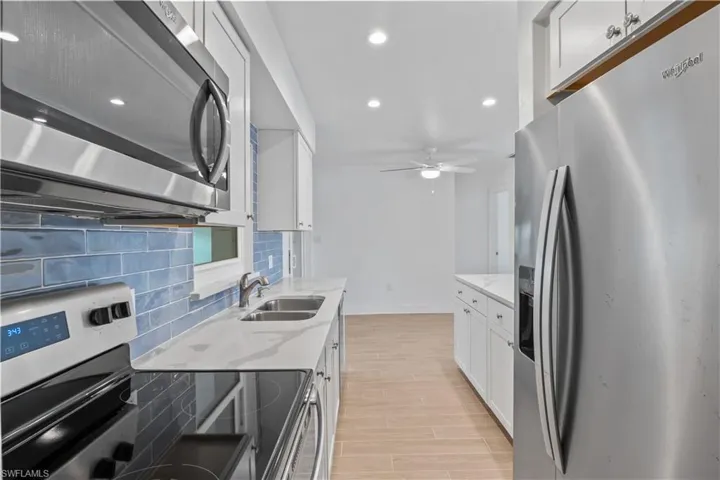 A chef’s dream kitchen featuring modern appliances, updated cabinetry, and a flawless layout.