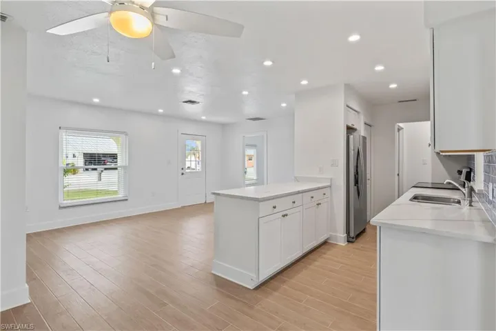 Seamless flow from kitchen to dining creates the perfect entertaining environment.