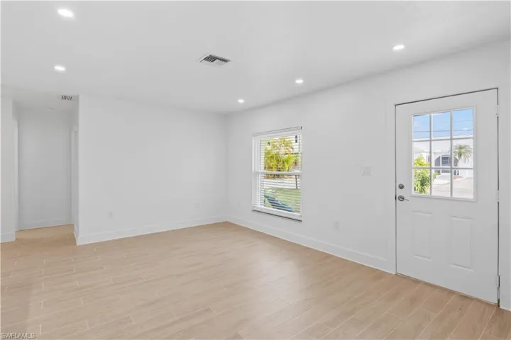 Bright and welcoming entry that sets the tone for the home’s open, airy layout.