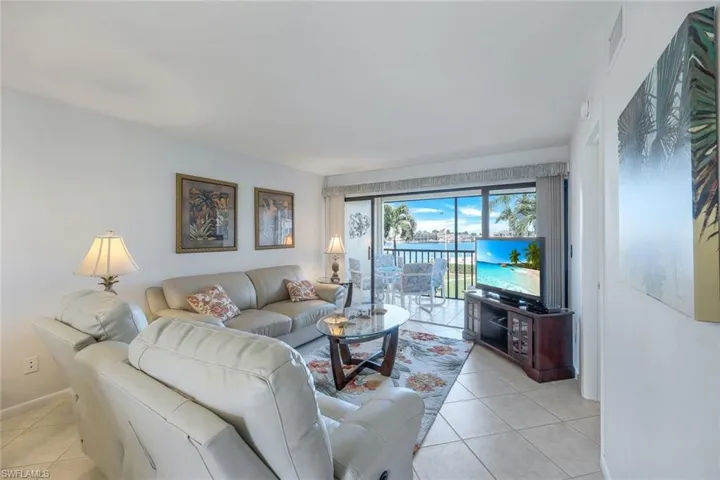 Living room featuring light tile patterned floors