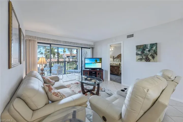Living room featuring light tile