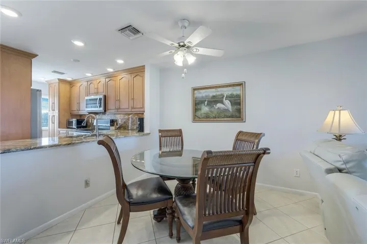 Dining area with ceiling fan