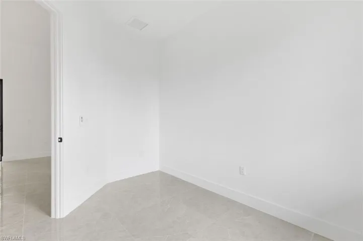 View of tiled spare room