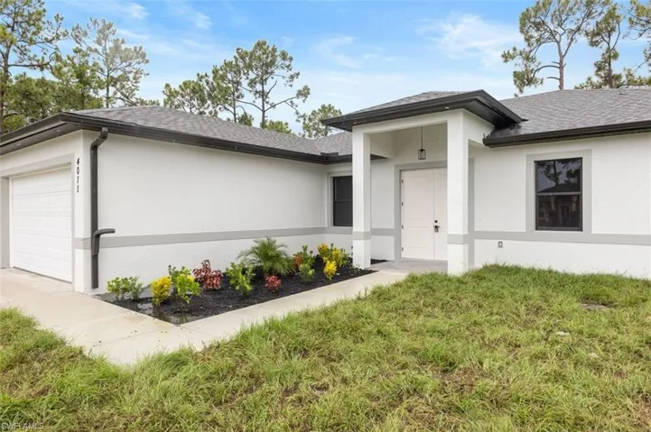 View of front of home with a garage