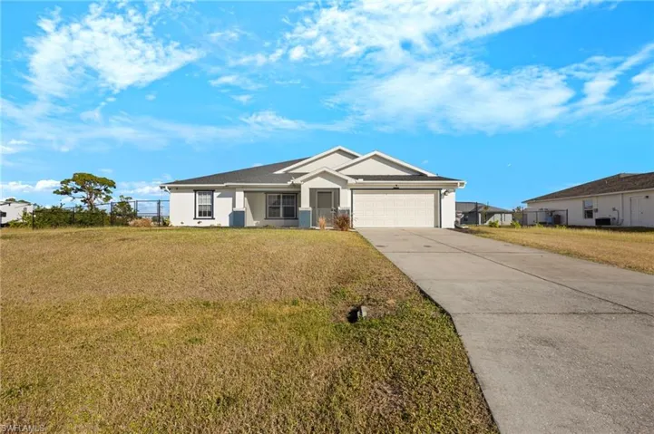 Single story 3+den/2.5 bath  home with a 2 car garage on a 3 lot site that is fenced!