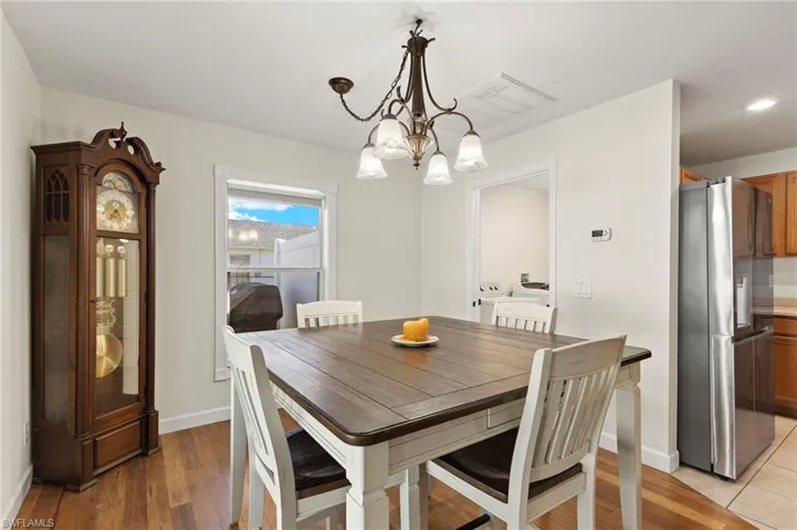 Dining area featuring hardwood / wood-style flooring