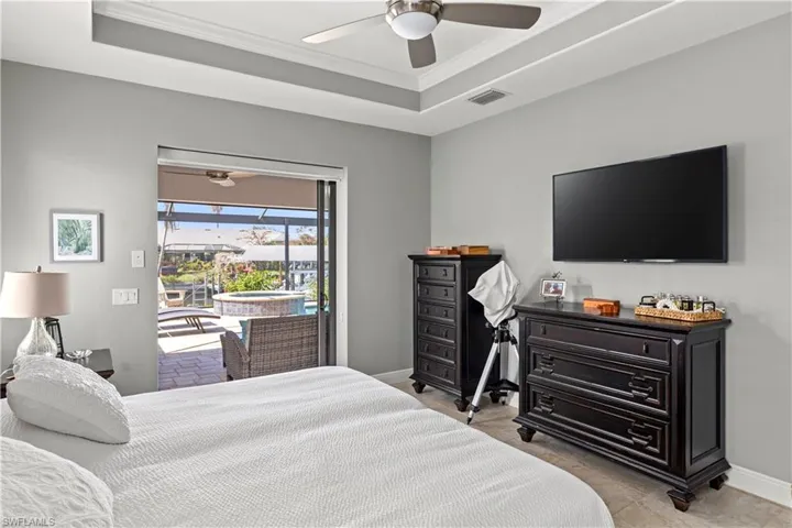 90 degree pocket doors to outside lanai, pool deck & WATER VIEWS!