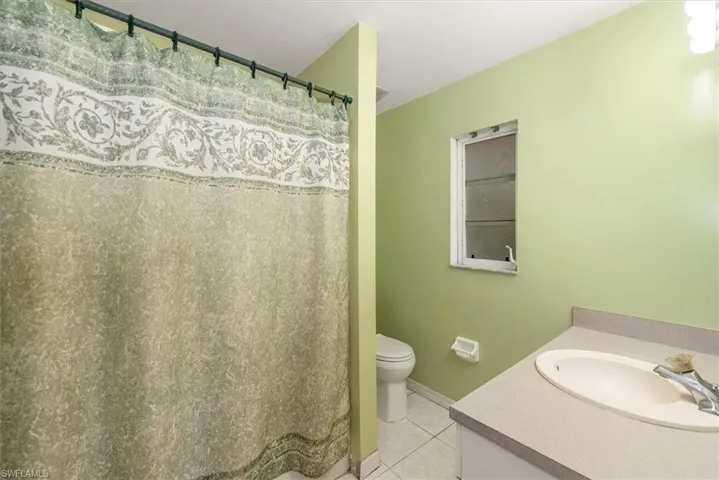 Primary bathroom with a shower tub combo