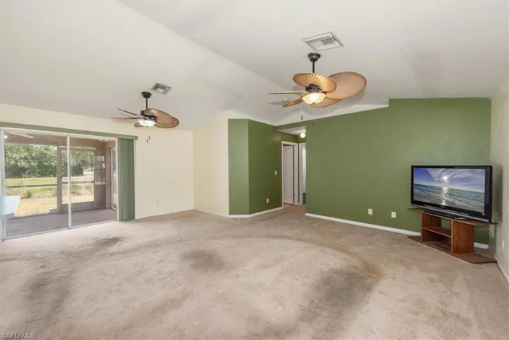 Family room view from the entry to the sliders
