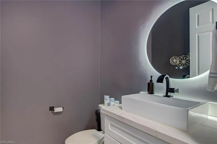 Bathroom featuring toilet and vanity