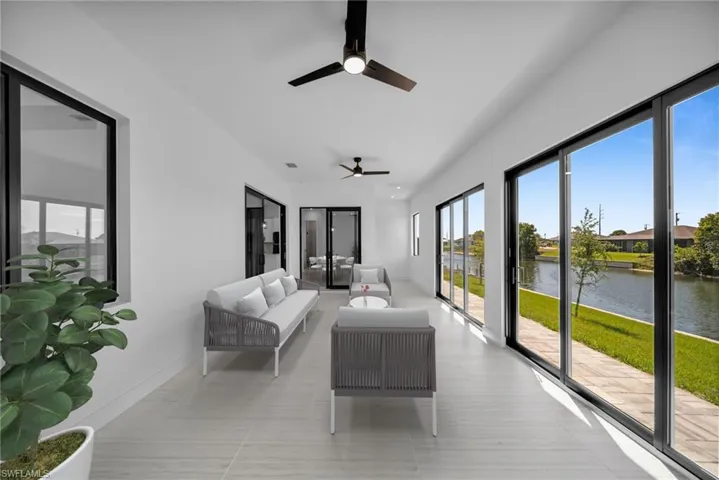Sunroom with a water view