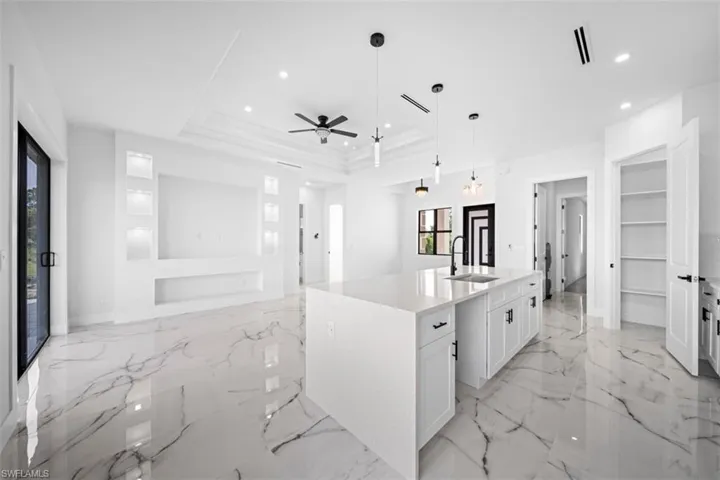 White marble-look flooring throughout