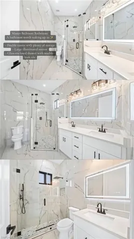 Spacious bathroom with marble-look tile, double vanity, and glass-enclosed shower