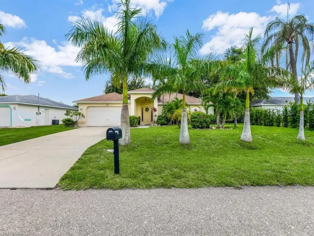 Fantastic SWFL Location-New Palms Trees & Privacy Hedges Surrounding the