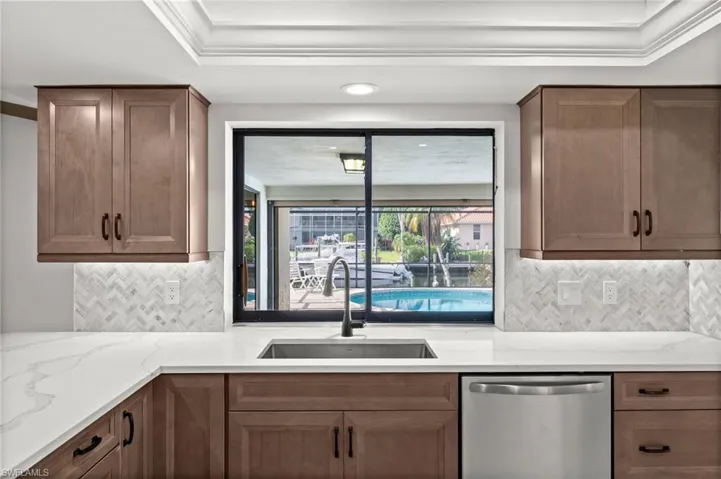 Remolded Kitchen - Wood Cabinets, Quartz Countertops & Stainless Steel Appliances