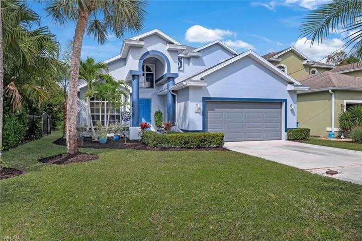 Welcome home to 9951 Utah Street, located MINUTES from Downtown Bonita Springs!