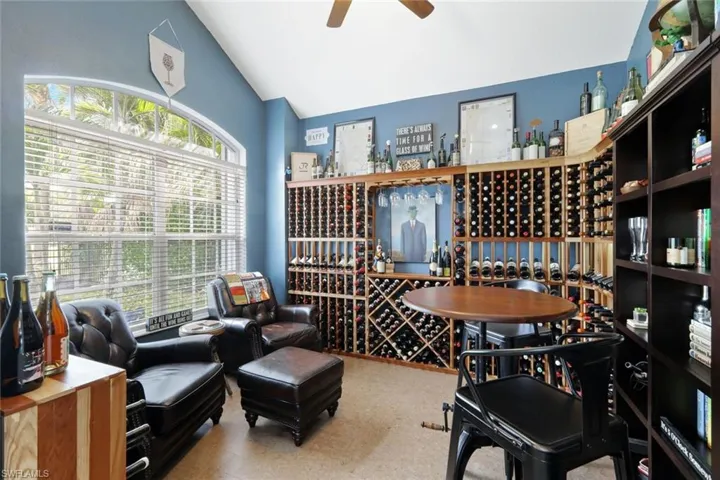 Den is currently being utilized as a wine collector's dream!