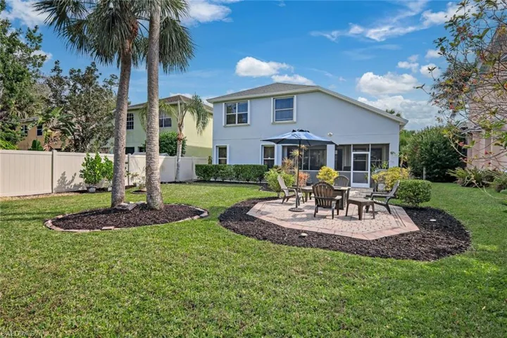 This oversized backyard offers PLENTY of room for a pool.