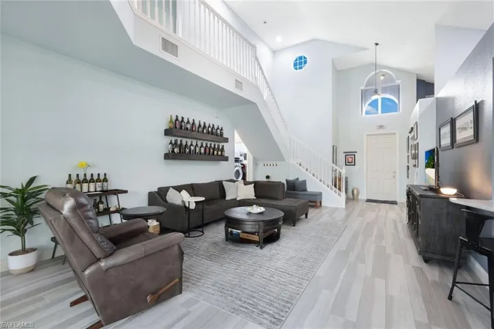 Grand entryway leading to the living and dining areas. This home is perfect for entertaining friends and family!