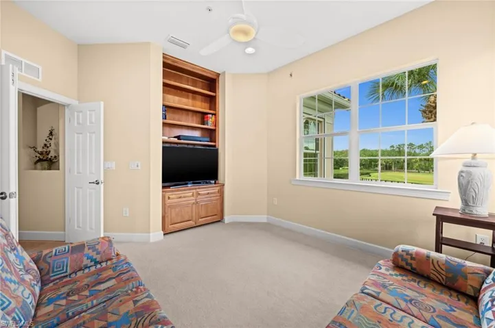 Office with Built In Cabinet and Shelves (could be converted to closet)